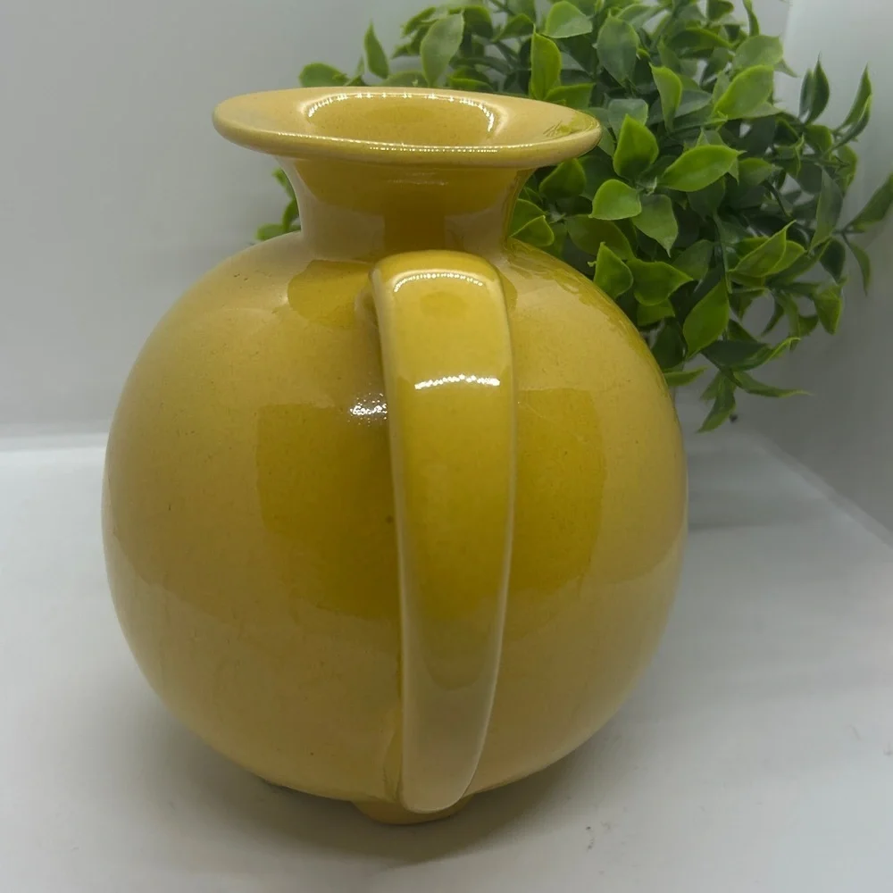 Frankoma Pottery Yellow MCM #82 Carafe dating back to the 1950s.